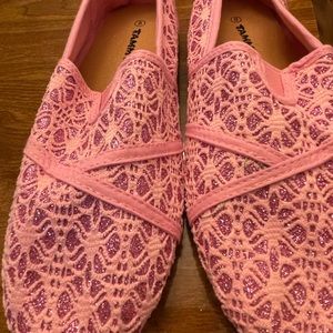 Never worn slipons. Pink metallic lace design